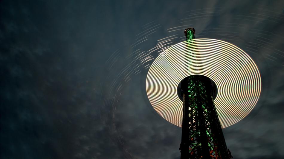 streaks of light around the tower at night
