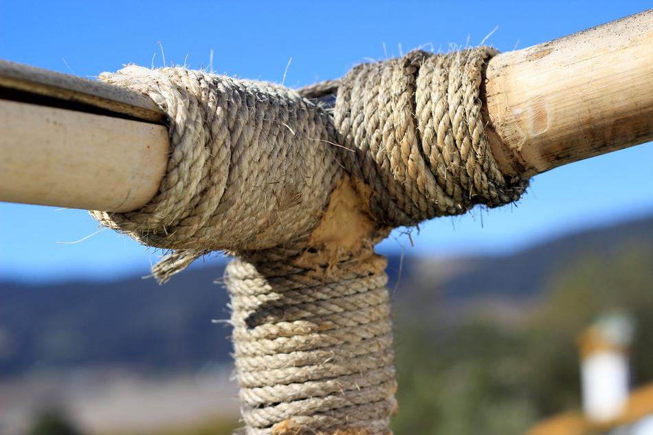 Tied rope on a wooden fence