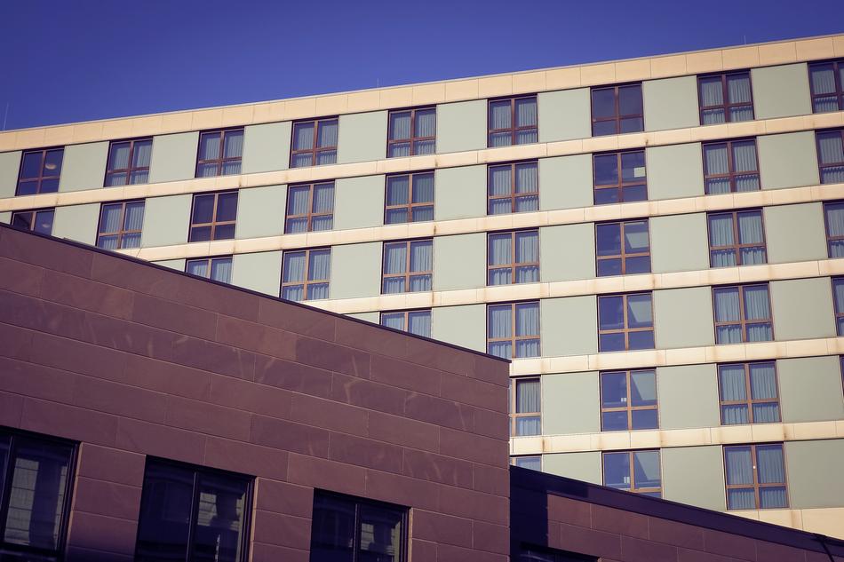 View of the buildings with windows, at blue sky on background, in DÃ¼sseldorf, Germany