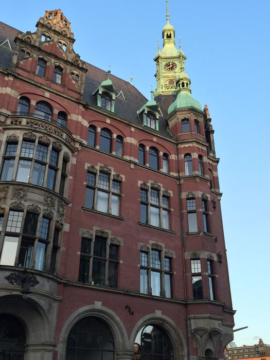 the old red castle with golden towers