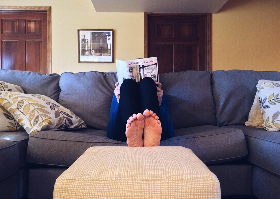 person reading at Home on Sofa