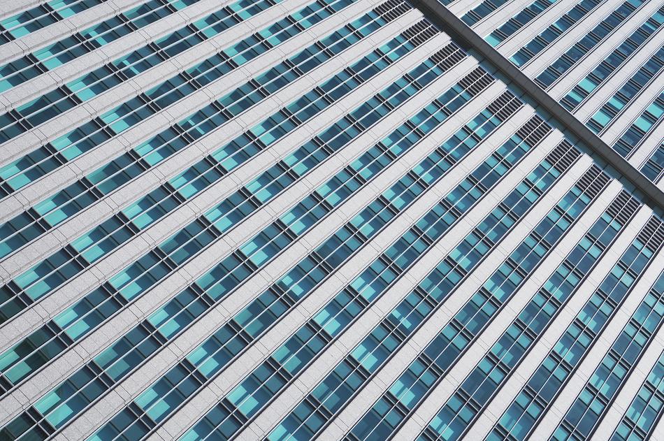 vertical panorama of a glass skyscraper