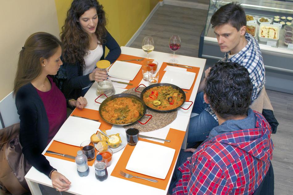 people chatting nicely at the table with food