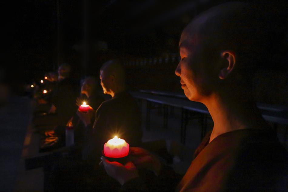 Nuns With Candles Making Wish
