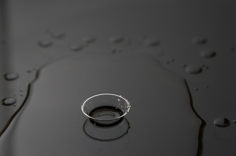Drop Of Water Liquid on black surface