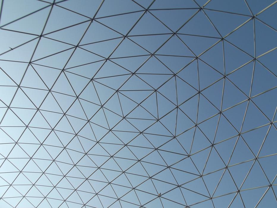 metal cage in the park against the sky