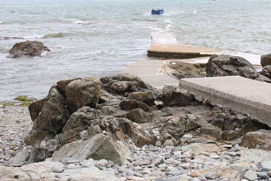 stone beach with the sea is beautiful