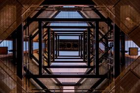 bottom view of steel tower at sky