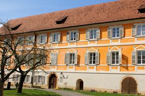 Colorful and beautiful, old Museum Kunstbau, among the plants, in Germany