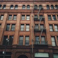 photo of the facade of the building with interfloor fire escape