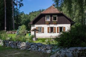 stone cottage at the foot of the Sumava mountain range in Germany