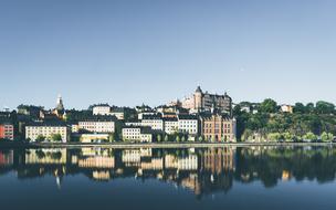 skyline of old city with reflection on water, sweden, Stockholm