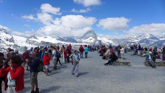 crowd of Tourists at scenic Matterhorn Mountain, switzerland