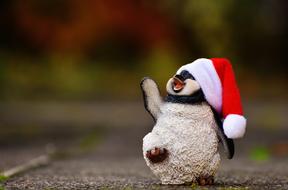 Penguin Figure with Christmas Santa