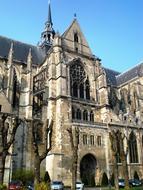 Beautiful, old church building in light, under the blue sky, in France