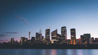 Lights of night city behind the river , australia, sydney