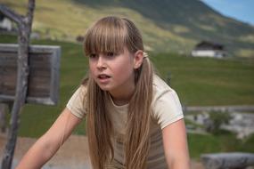 blond Child girl cycling outdoor