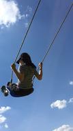 joyful swinging girl