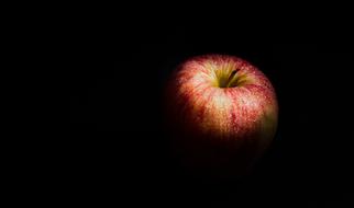 sweet apple on a black background