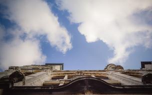 Building in Ghent, Belgium at the blue sky background with white clouds