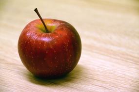 One red ripe apple