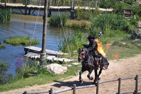 crazy man on a horse on fire