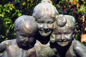 sculpture of children by the fountain