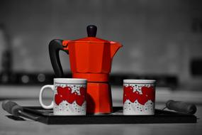 red teapot with cups