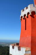 red wall of medieval fortress at sky