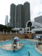 pool on the background of a skyscraper in Hong Kong, China