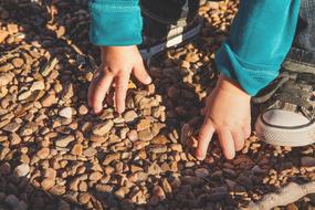 Child Footwear Hands and stones