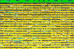 yellow facade of High-Rise apartment Building