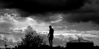 black and white picture of a man silhouette