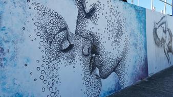 Kiss love graffiti wall