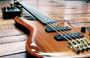 electric guitar on wooden table