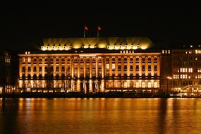 hamburg architecture reflected in water at night