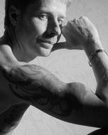 monochrome photo of Man Muscles Tattoo