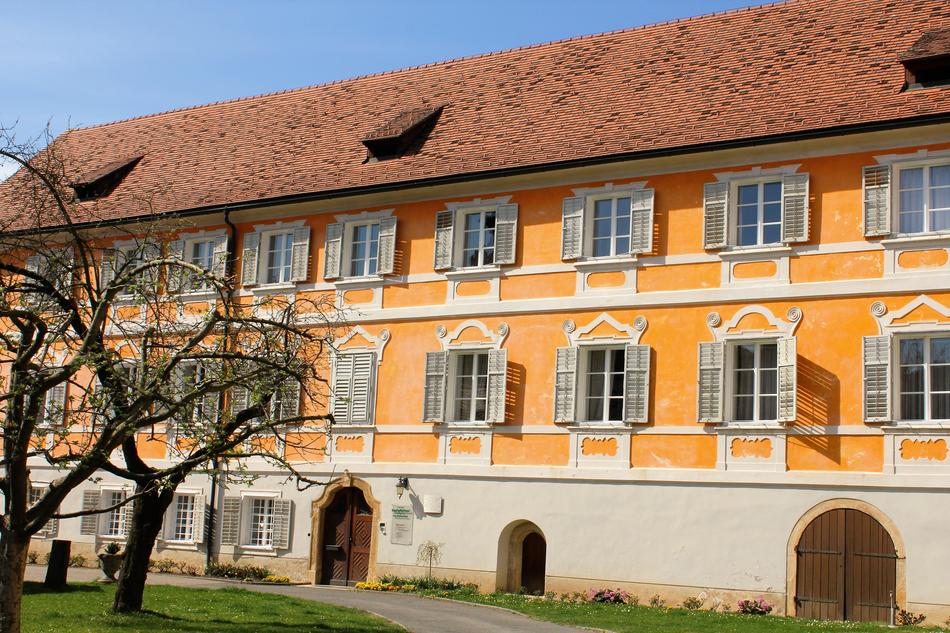 Colorful and beautiful, old Museum Kunstbau, among the plants, in Germany
