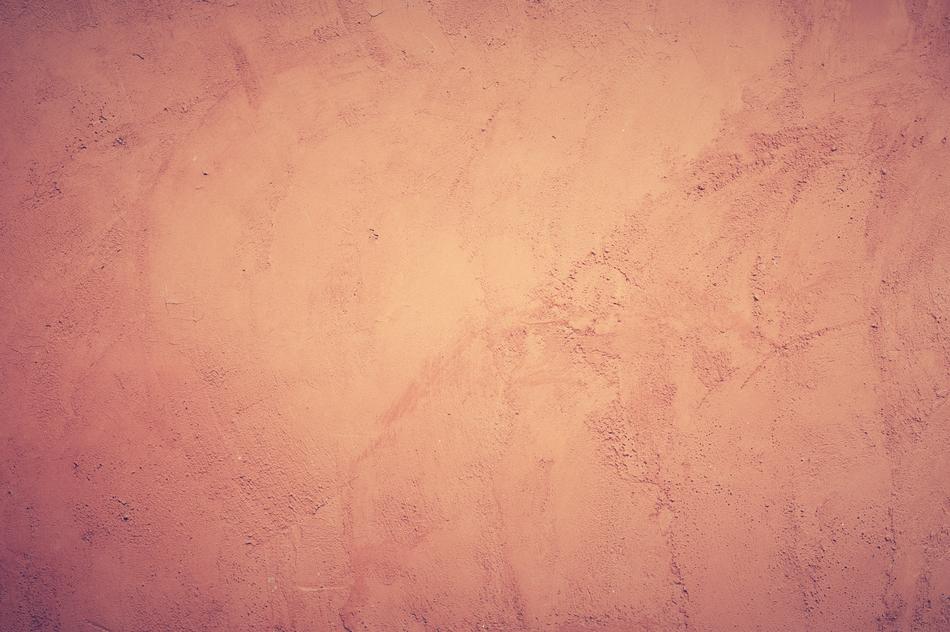 Beautiful concrete wall with pink and orange shade