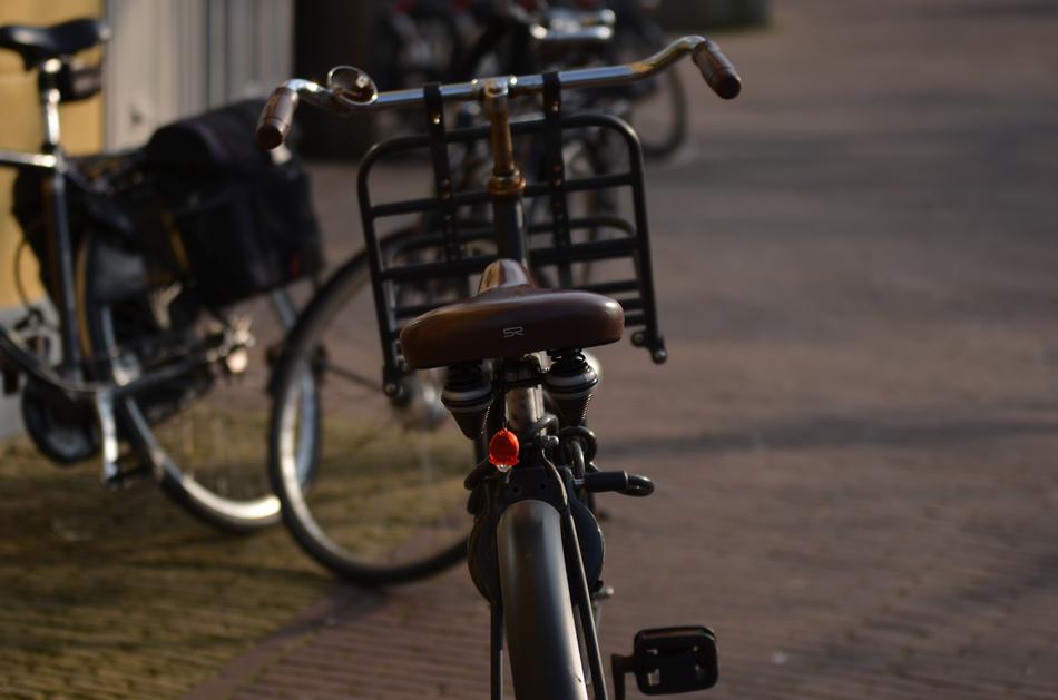 black bicycle with leather seat