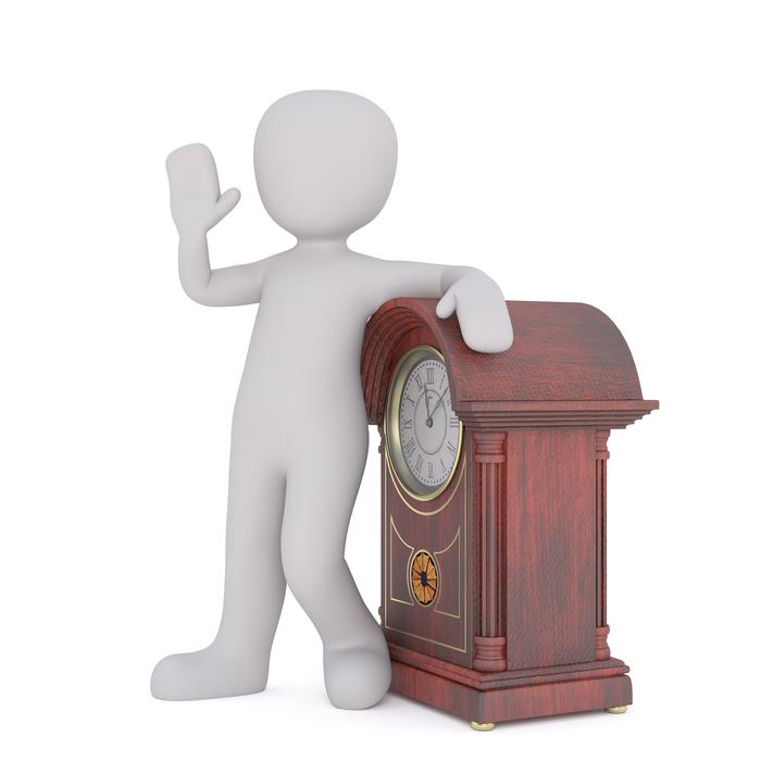 model of a man with a wooden clock