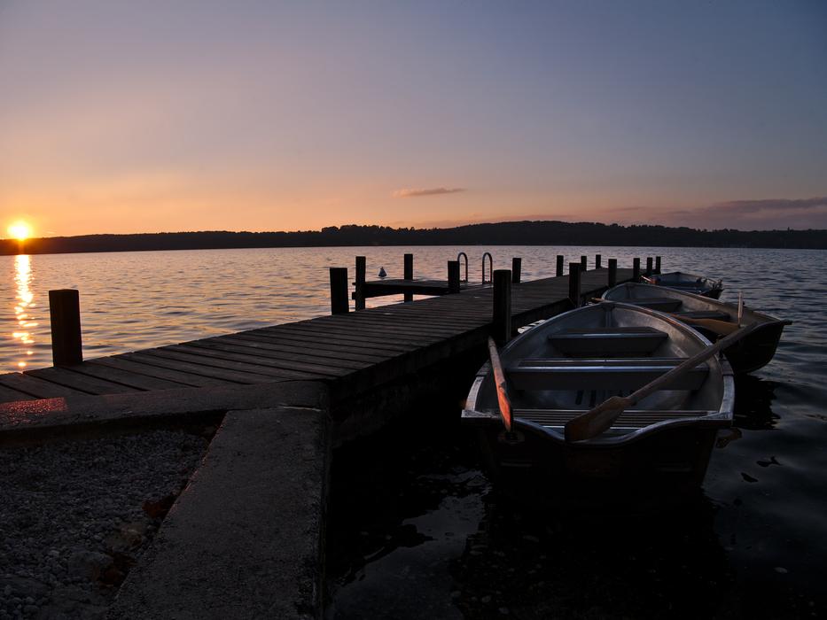 boat on the beach by the bridge