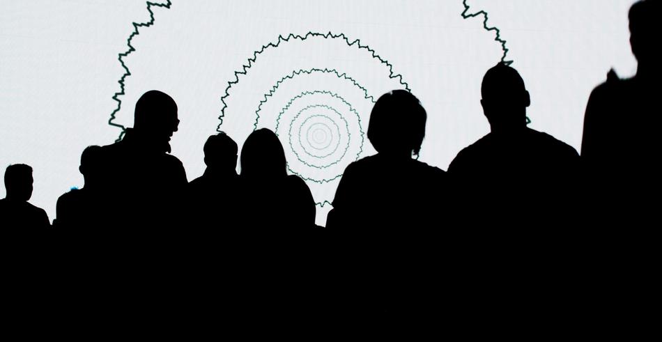 group of people and sound waves