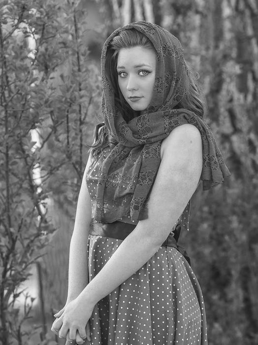 Black And White portrait of young girl in Vintage headscarf