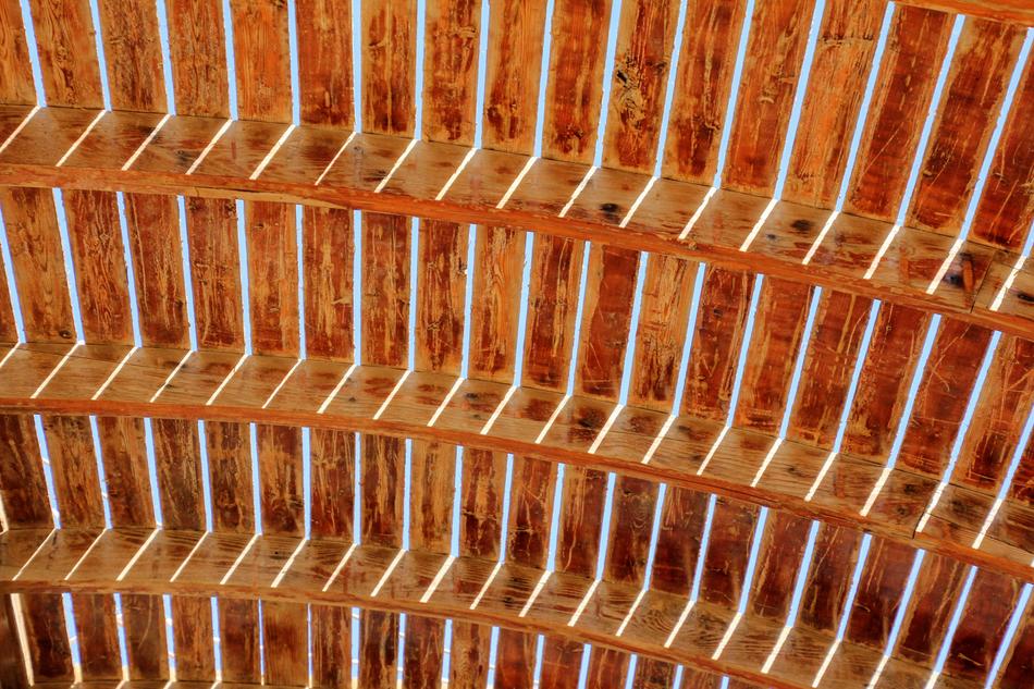 Beautiful bottom view of the wooden bridge in light