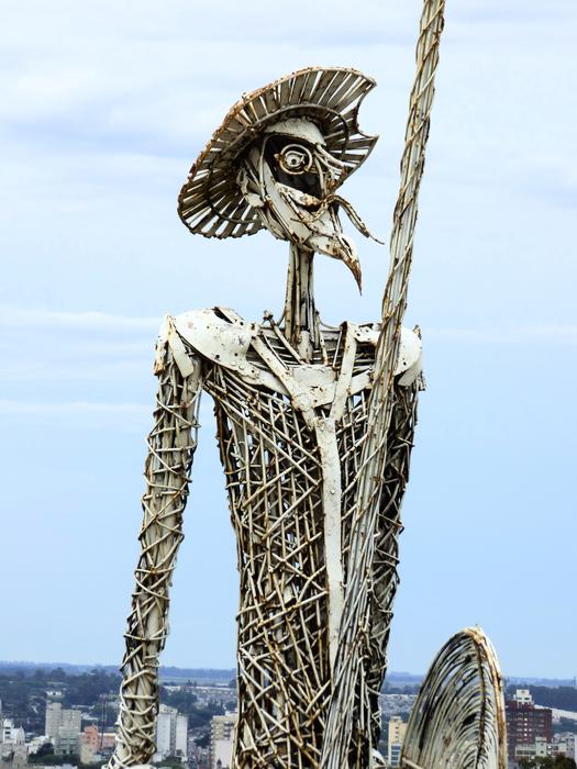 an unusual sculpture in the field
