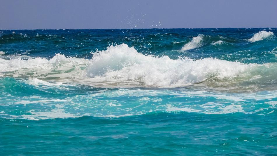 sea beach with white waves