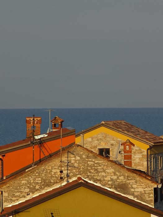 Roofs and Sea and Sky