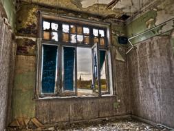 old wooden window in an abandoned building