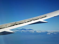 beautiful view of an airplane wing in the sky